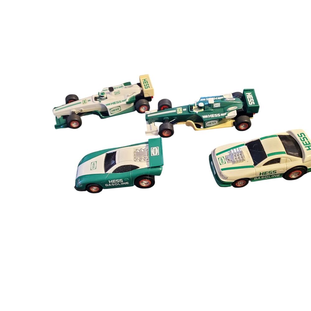 Four Hess Truck Race Cars 2003 Formula One and 1997